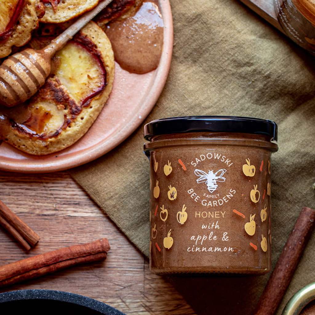 Glass jar of apple cinnamon multiflower honey with apples and cinnamon – Honey & Bloom Singapore