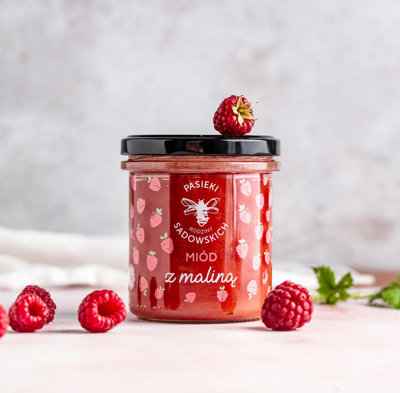 Multiflower honey with freeze-dried raspberries by Sadowski Bee Gardens, artisan honey available in Singapore