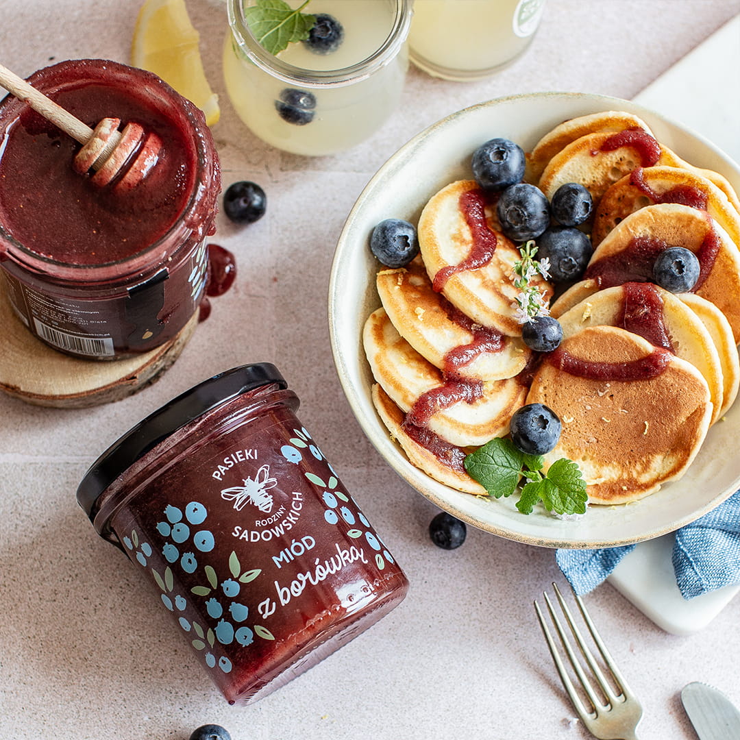 Close-up texture of blueberry-infused honey from Sadowski Bee Gardens, showing its smooth consistency